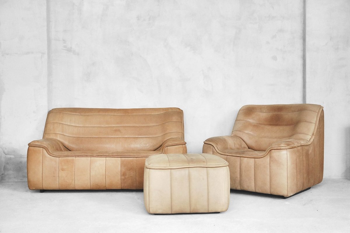 Skórzany komplet wypoczynkowy De Sede: sofa i fotel z podnóżkiem, lata 70 - vintage design od garage garage